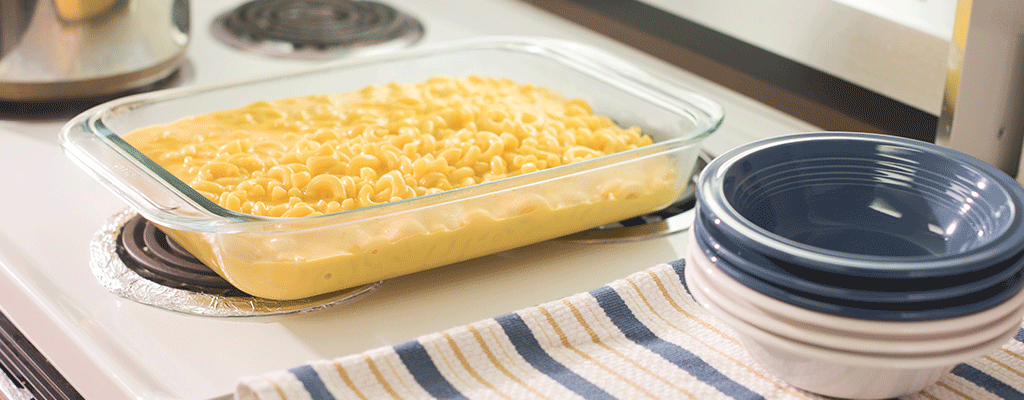 A Dish of Macaroni and Cheese On A Stove Top