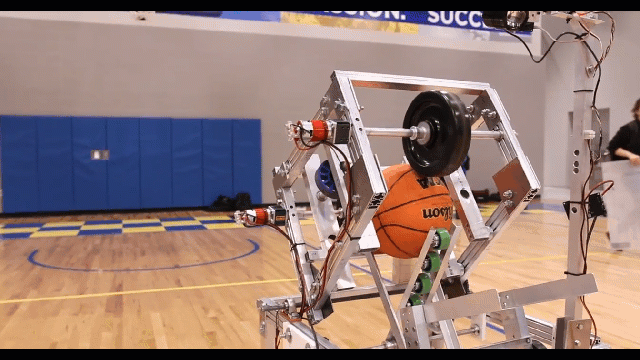 South Dakota State University Robot Shooting A Basketball